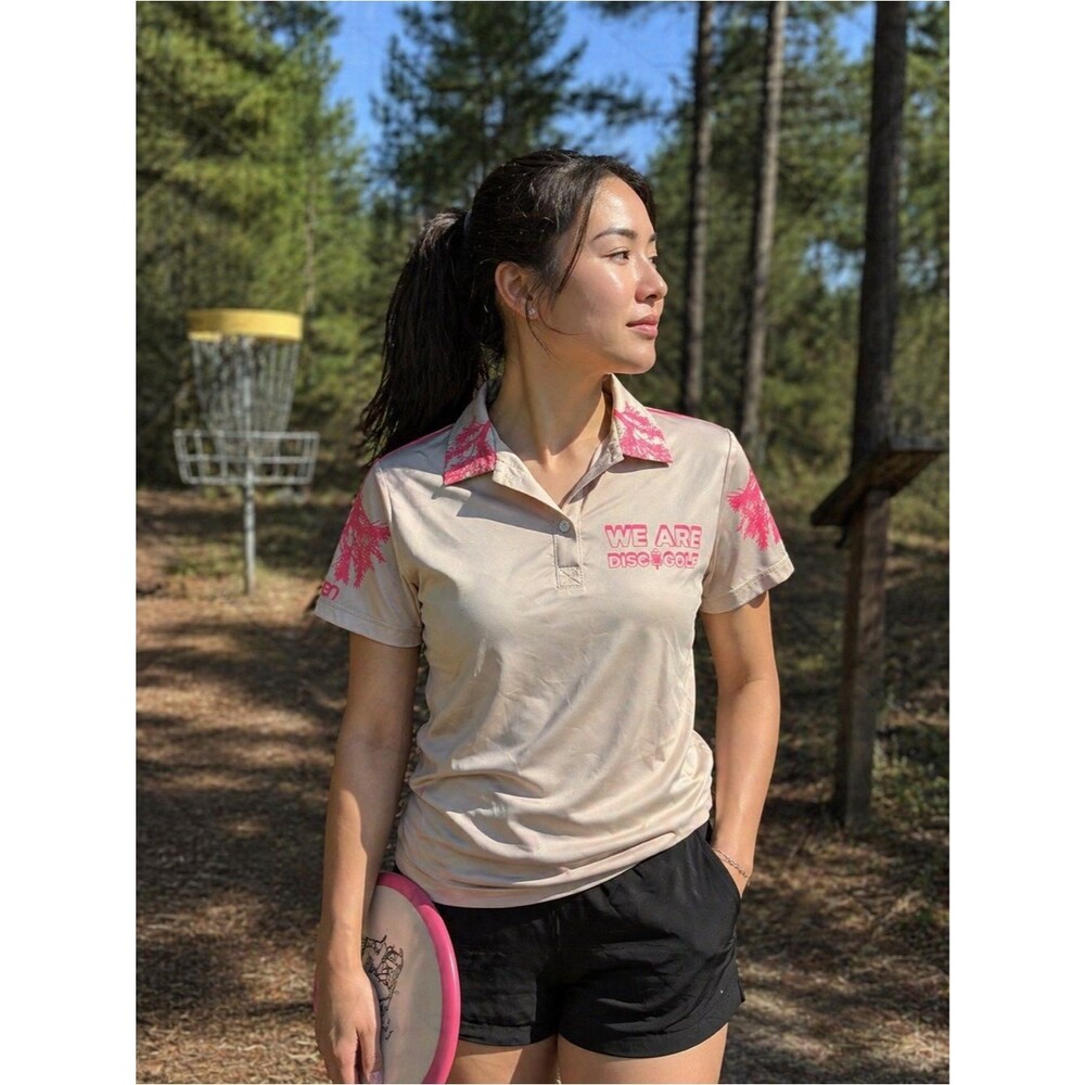 Women's Eleven Sportswear Beige Polo Disc Golf Shirt with Pink Accents